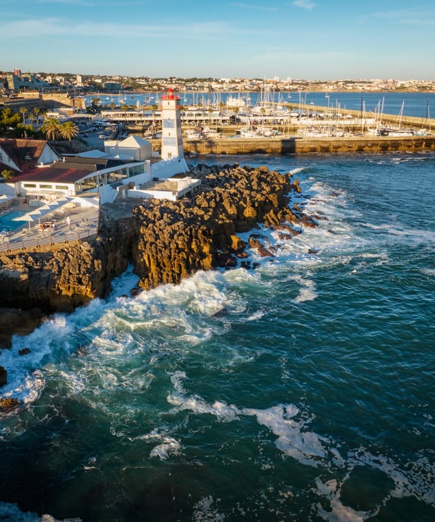 Placeholder photograph — the marina and headland at Cascais from the air