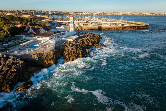 Placeholder photograph — the marina and headland at Cascais from the air